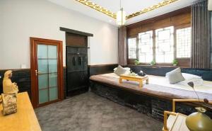 Зона вітальні в Pingyao Yihao Inn
