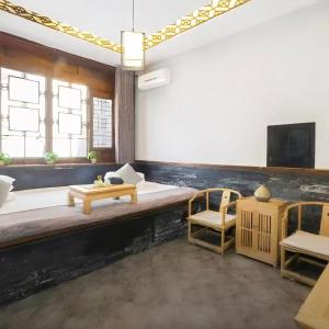 Телевізор і / або розважальний центр в Pingyao Yihao Inn