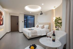 Nápoje v ubytování Changsha AquaEdge Hotel Wuyi Square长沙悦己阅湘江酒店