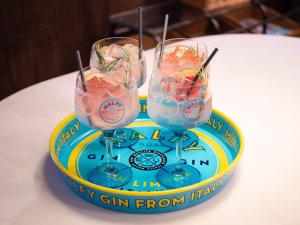 three drinks on a clock on a table at The Grand Hotel Birmingham in Birmingham