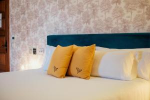 Postel nebo postele na pokoji v ubytování Hotel Cetina Palacio Ayala Berganza