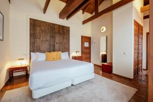Postel nebo postele na pokoji v ubytování Hotel Cetina Palacio Ayala Berganza