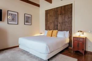 Postel nebo postele na pokoji v ubytování Hotel Cetina Palacio Ayala Berganza