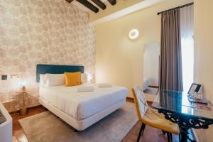 Postel nebo postele na pokoji v ubytování Hotel Cetina Palacio Ayala Berganza