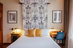 Postel nebo postele na pokoji v ubytování Hotel Cetina Palacio Ayala Berganza