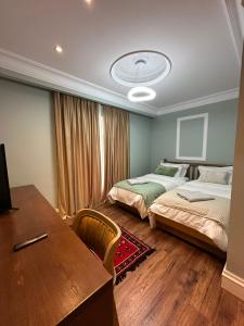 Postel nebo postele na pokoji v ubytování Flored Hotel
