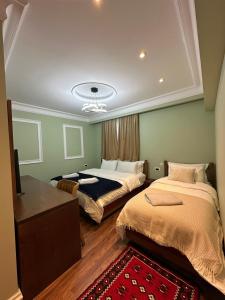 Postel nebo postele na pokoji v ubytování Flored Hotel