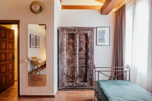 Postel nebo postele na pokoji v ubytování Hotel Cetina Palacio Ayala Berganza