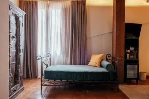 Postel nebo postele na pokoji v ubytování Hotel Cetina Palacio Ayala Berganza