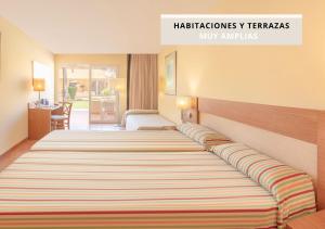 Postel nebo postele na pokoji v ubytování Hotel RH Casablanca Suites