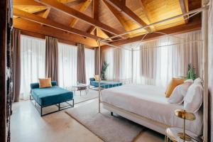 Postel nebo postele na pokoji v ubytování Hotel Cetina Palacio Ayala Berganza