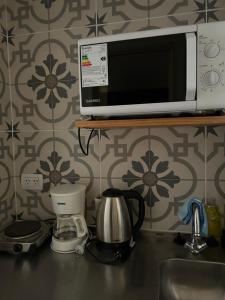 Kuchyň nebo kuchyňský kout v ubytování Maipu Apartment Studio