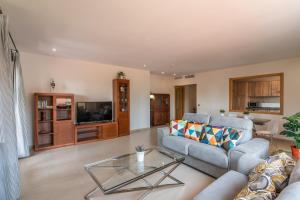 A kitchen or kitchenette at Playa Marina by Ĥ