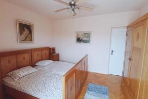 Postel nebo postele na pokoji v ubytování Apartment Magnolia