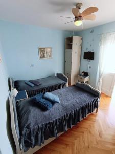 Postel nebo postele na pokoji v ubytování Apartment Magnolia