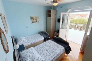 Postel nebo postele na pokoji v ubytování Apartment Magnolia