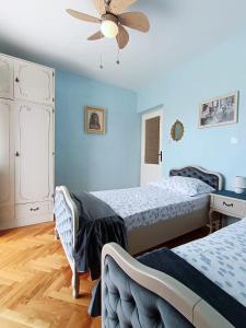 Postel nebo postele na pokoji v ubytování Apartment Magnolia
