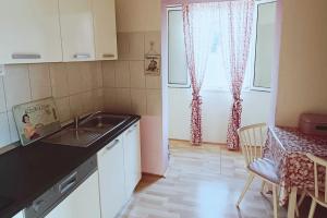 Kuchyň nebo kuchyňský kout v ubytování Apartment Magnolia