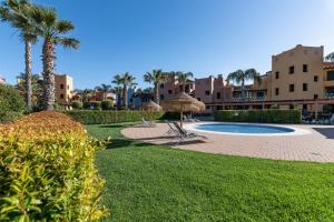 The swimming pool at or close to El Rincon del Golf II by Ĥ - Isla Canela Golf GRHII18P21