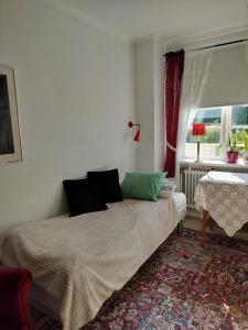 Postel nebo postele na pokoji v ubytování Pilane B&B