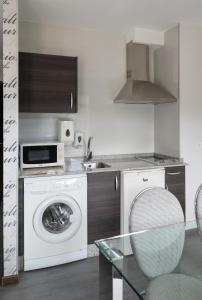 Kuchnia lub aneks kuchenny w obiekcie Alvear Suites