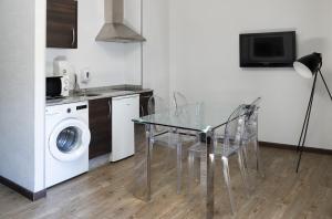 Kuchnia lub aneks kuchenny w obiekcie Alvear Suites