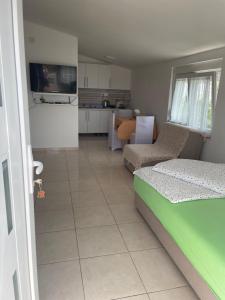 Kuchyň nebo kuchyňský kout v ubytování MIT-Apartments + 23 fotografií