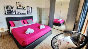 Letto o letti in una camera di A casa di Nina & Turi con giardino e veranda