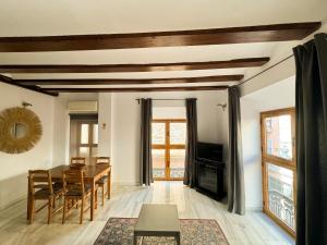 Posezení v ubytování Duplex en el Carmen 1