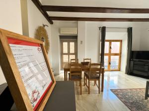 TV a/nebo společenská místnost v ubytování Duplex en el Carmen 1