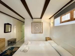 Postel nebo postele na pokoji v ubytování Duplex en el Carmen 1