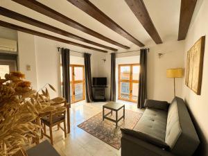 TV a/nebo společenská místnost v ubytování Duplex en el Carmen 1