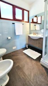 Bagno di A casa di Nina & Turi con giardino e veranda