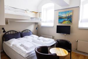 Posteľ alebo postele v izbe v ubytovaní STF Långholmen Hostel
