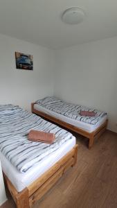 Posteľ alebo postele v izbe v ubytovaní Apartament Biały Domek