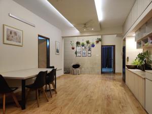 an office with a table and chairs in a room at Dar Al Habib in Dhaka