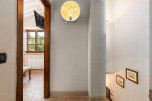 A television and/or entertainment centre at Villa San Michele by PosarelliVillas
