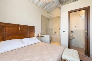 A bed or beds in a room at Villa San Michele by PosarelliVillas