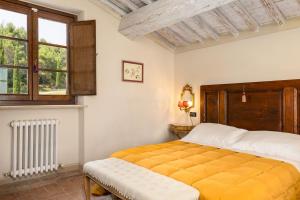 A bed or beds in a room at Villa San Michele by PosarelliVillas