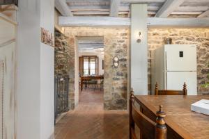 A kitchen or kitchenette at Villa San Michele by PosarelliVillas