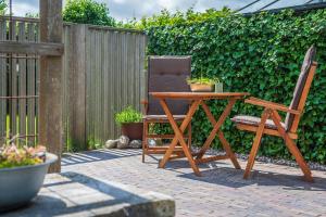 Billede fra billedgalleriet på Gastsuite het Duinroosje met hottub op het privé terras! i Den Burg