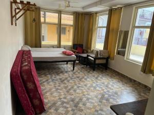 Giường trong phòng chung tại Santushti