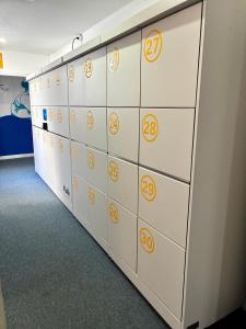 a row of lockers with numbers on them at Casual Serantes in Bilbao