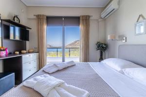 Postel nebo postele na pokoji v ubytování Villa Armonia + 37 fotografií