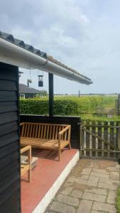 Un balcón o terraza de Split-Level Holiday Home With View Of Årø