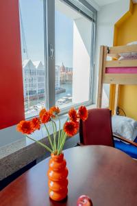 Ένα ή περισσότερα κρεβάτια σε δωμάτιο στο Hostel Gdańsk Szafarnia 10 Old Town
