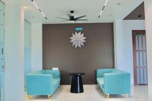 Ruang duduk di Hotel Laxmi Elite Karad