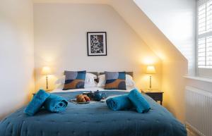 Postel nebo postele na pokoji v ubytování Gad About