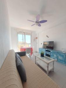 A television and/or entertainment centre at Alquilaencanarias-Medano, Cabezo beach, sea views!
