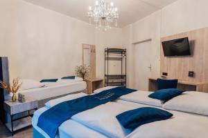 Postel nebo postele na pokoji v ubytování Steens Hotel Alster City